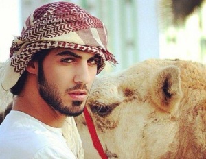 This is Omar Bourkan Al Gala with a camel.  He calls this look "Blue Steel."  Photo from huffingtonpost.com